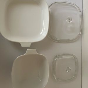 Pyrex dishes in good condition. White with blue flowers.